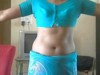 Krithi Make A Notation Of Belly Button Joshing Up Half Saree